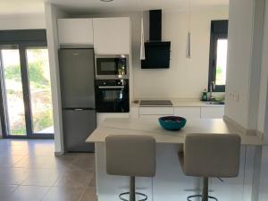 Nhà bếp/bếp nhỏ tại Chalet rural en Angeles de San Rafael