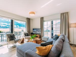 Ein Sitzbereich in der Unterkunft Tauern Lodge L