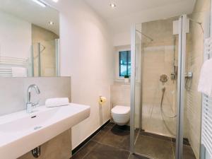 Ein Badezimmer in der Unterkunft Tauern Lodge L