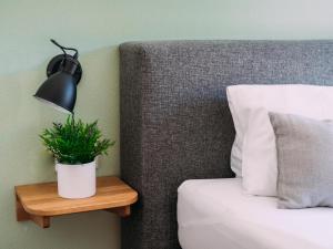 Ein Bett oder Betten in einem Zimmer der Unterkunft Tauern Lodge L