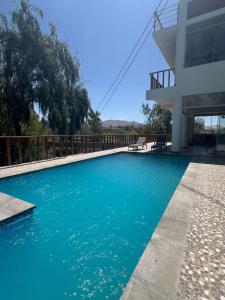 Πισίνα στο ή κοντά στο Villa Rodríguez-Peña