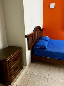 Carolina's Hostel tesisinde bir odada yatak veya yataklar