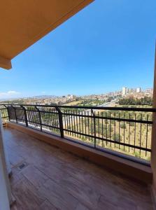 a balcony with a view of a river at Très beaux F4 Annaba in Zonka
