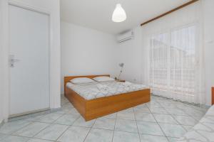 Postel nebo postele na pokoji v ubytování Apartments by the sea Podaca, Makarska - 515