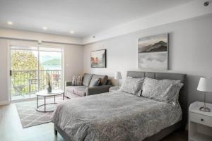 Ένα ή περισσότερα κρεβάτια σε δωμάτιο στο Gibsons Landing Inn