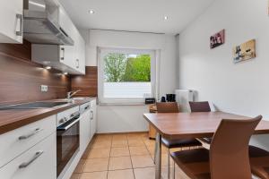 Kuchyň nebo kuchyňský kout v ubytování Carpe Tempus + 17 fotografií