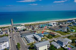 an aerial view of a town next to the beach at Lorraine's Beach Cottage in Kure Beach