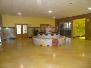 a large room with a cake in the middle of it at Costa Marina III Oropesa Apartment in Oropesa del Mar +45 photos