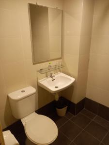 Koupelna v ubytování Syajie Koptown Hotel