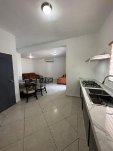 Cuina o zona de cuina de Condominio Rocamar