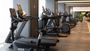 a row of exercise bikes in a gym at Shinagawa Prince Hotel N Tower in Tokyo