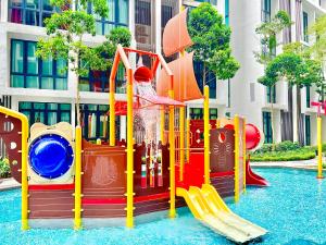 a playground in the middle of a water park at 1-8 pax Comfort Place 3room Ara Damansara in Petaling Jaya