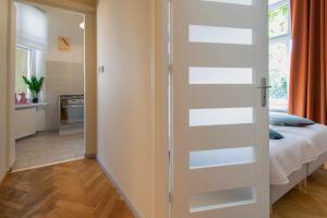Posteľ alebo postele v izbe v ubytovaní Vintage Apartment Gertrudy street