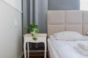 Posteľ alebo postele v izbe v ubytovaní Vintage Apartment Gertrudy street