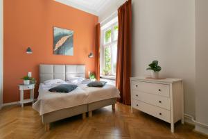 Posteľ alebo postele v izbe v ubytovaní Vintage Apartment Gertrudy street