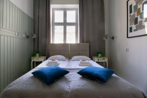 Posteľ alebo postele v izbe v ubytovaní Vintage Apartment Gertrudy street