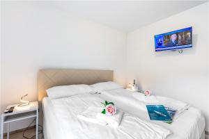 Postel nebo postele na pokoji v ubytování Residenza La Serenata