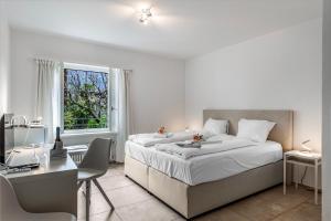 Postel nebo postele na pokoji v ubytování Residenza La Serenata