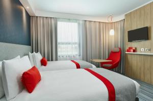 Ліжко або ліжка в номері Holiday Inn Express Ajaccio by IHG