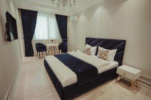 Katil atau katil-katil dalam bilik di Home Apartment Standard