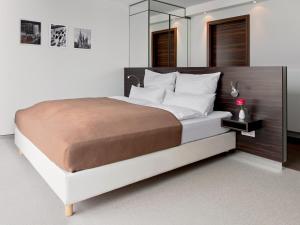 Кровать или кровати в номере Boardinghouse Bielefeld