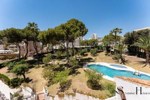 Swimmingpoolen hos eller tæt på 2bed beach apartment , first line lux
