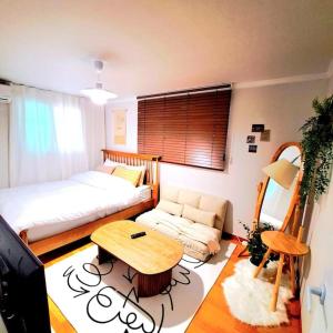 Ένα ή περισσότερα κρεβάτια σε δωμάτιο στο Healing & Romang house