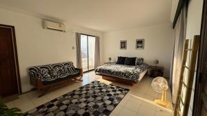 Katil atau katil-katil dalam bilik di Sunset Tower Homestay +25 gambar