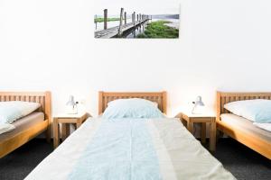 Ένα ή περισσότερα κρεβάτια σε δωμάτιο στο Stubefrei Appartement 801