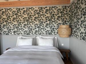 Postel nebo postele na pokoji v ubytování B&B In de duinen