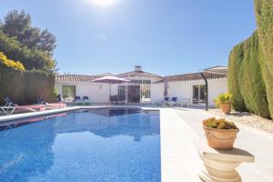 Bazén v ubytovaní Pool Villa Rancho Domingo family friendly - Happy Rentals alebo v jeho blízkosti
