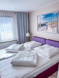 Postel nebo postele na pokoji v ubytování Ferienwohnung - Seebad UeckermündeOT Bellin