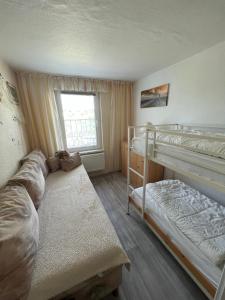 Postel nebo postele na pokoji v ubytování Ferienwohnung - Seebad UeckermündeOT Bellin