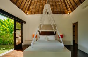 Un pat sau paturi într-o cameră la Bvilla Spa