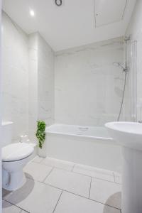 Kylpyhuone majoituspaikassa Vertigo Apartments