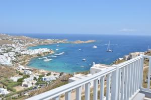 a view of a bay with boats in the water at Villa Thelgo Mykonos in Psarou