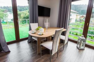 Apartamenty Dawna Wisłaにある庭