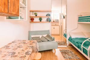 Postel nebo postele na pokoji v ubytování Lido Spina - Grazioso monolocale con Piscina + 13 fotografií