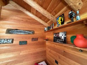 a wooden cabin with wooden walls and ceilings at Mulino Amore; Il nido tra i monti in Alagna Valsesia +21 photos