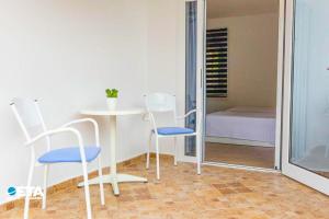 Postel nebo postele na pokoji v ubytování Angelina Hotel