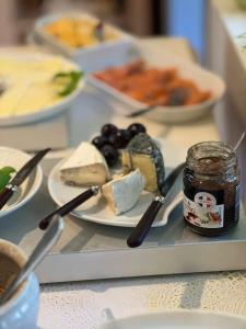 a table with a plate of food on a table at Hauane Bed and Breakfast in Sandnes +19 photos