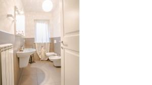 Et badeværelse på Myconos Deluxe D3 - Pineto Vacanza