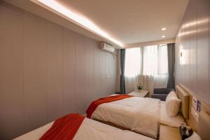 Katil atau katil-katil dalam bilik di KeTangJian Aparthotel