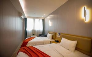 Katil atau katil-katil dalam bilik di KeTangJian Aparthotel