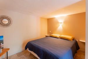 Posteľ alebo postele v izbe v ubytovaní Maison Marvic, Le Tilleul T3