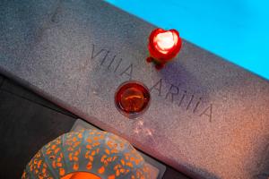 a red fire hydrant with the words vikingarma written on it at Villa Arilia in Agnítsini