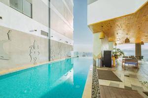 a swimming pool in a house at HD Panorama Nha Trang Condotel & Pool in Nha Trang