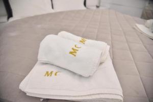 Katil atau katil-katil dalam bilik di Apartmani Sofrenic-Hotel Adonis