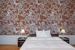 Letto o letti in una camera di Boutique-Hotel Auberge Langenthal