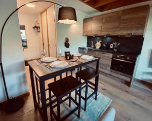 Kuchyň nebo kuchyňský kout v ubytování Appartement Laline
